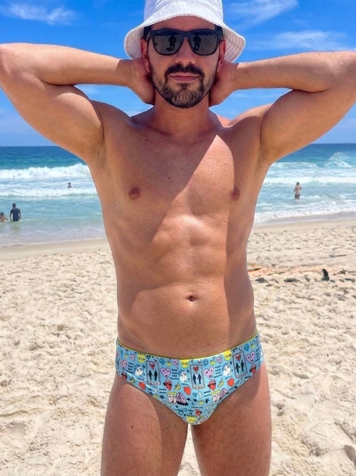 Men's blue icon swim brief by GODO — bold body-enhancing beach swimwear